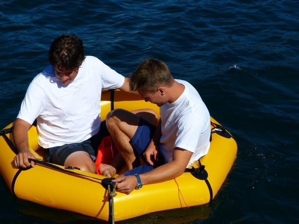 two people in coastal life raft