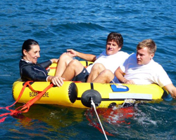 3 people in coastal life raft
