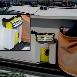 racing trimaran carries dan buoy in dan hold
