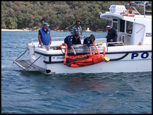 Sea Scoopa over the side of a rescue craft